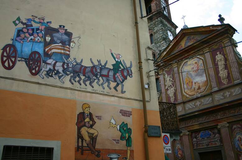 Uno dei dipinti sui muri di Vernante dedicati a Pinocchio